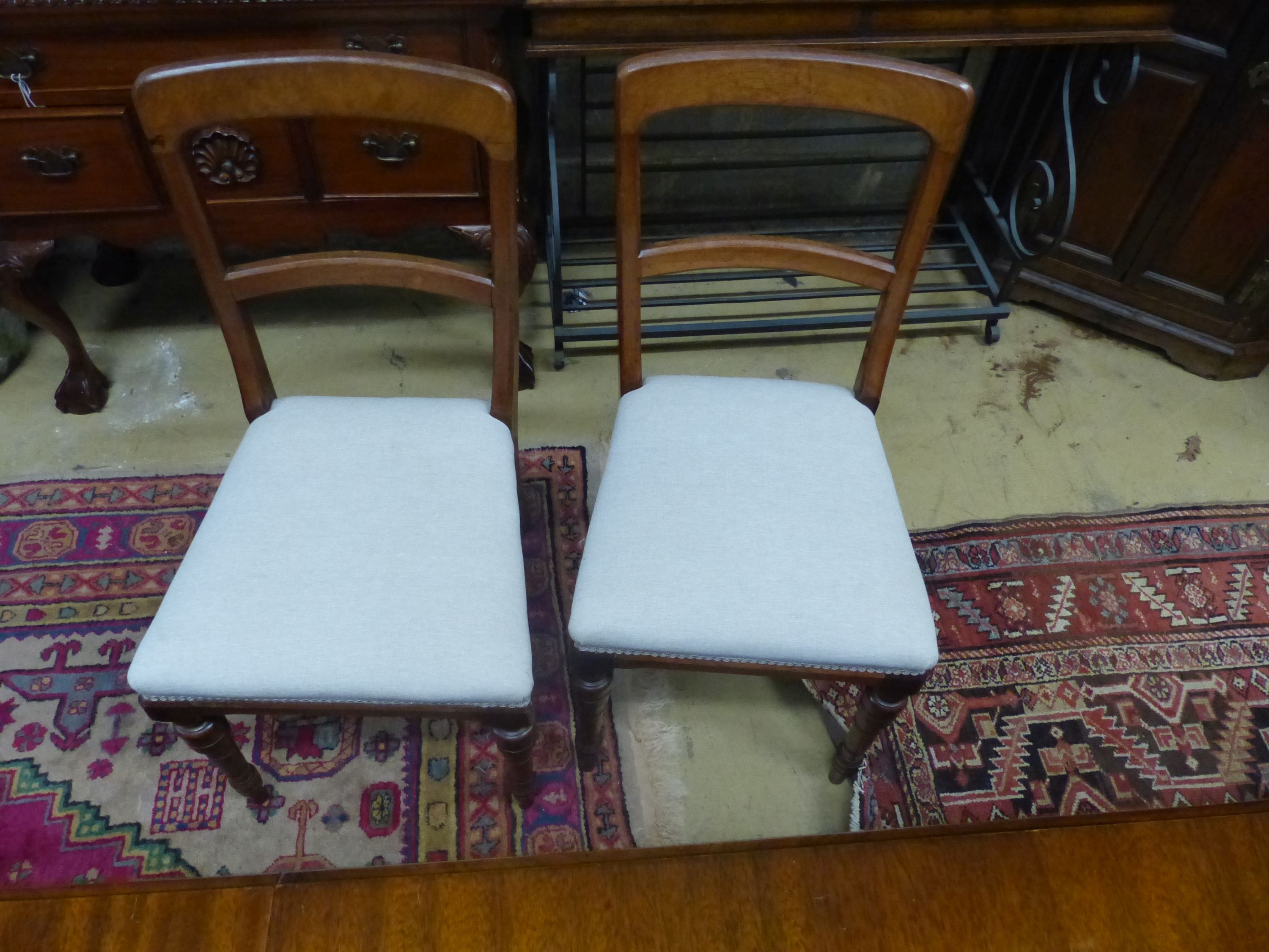 A set of four late Victorian mahogany dining chairs